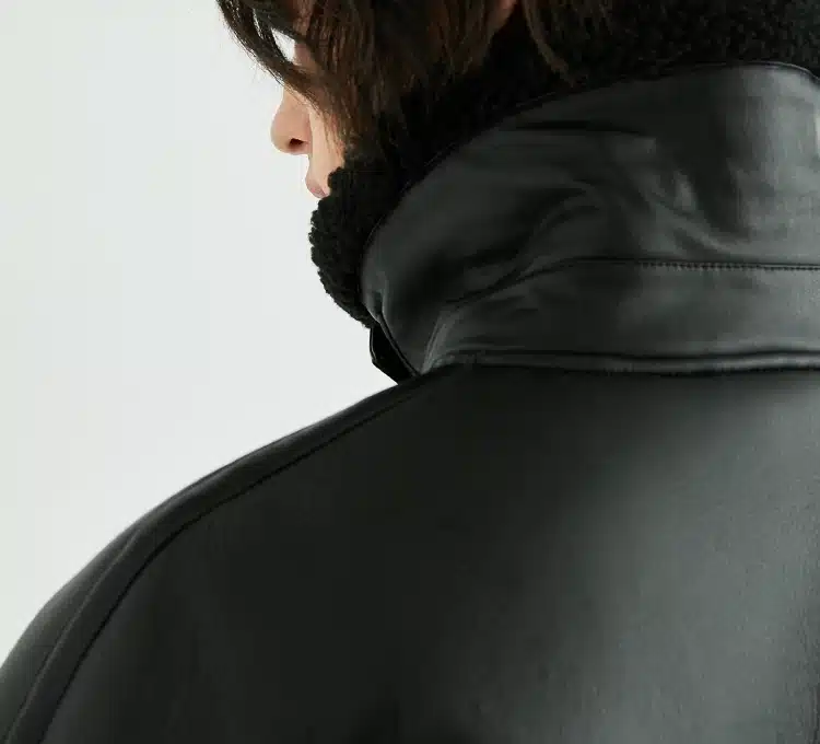 xh25w6037 (1) Model wearing Style #6037 PU leather bomber jacket with fleece collar