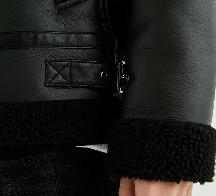 xh25w6037 (2) Adjustable buckle and zipper detail on Style #6037 PU leather bomber jacket