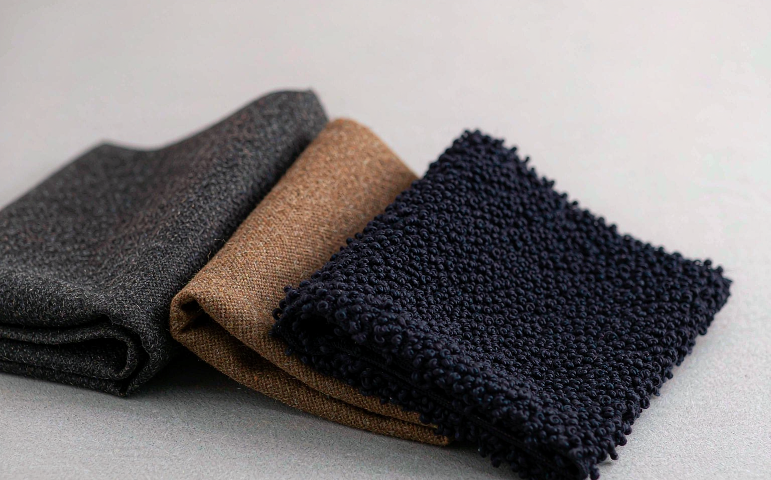 Wool coat manufacturing in China — fabric grades melton, loden and bouclé