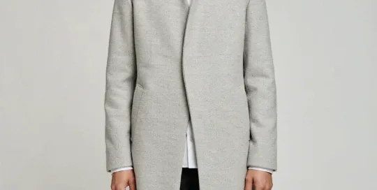 Men's light grey melange coat with asymmetric concealed placket, AI-rendered model front view - Style XH25W2107