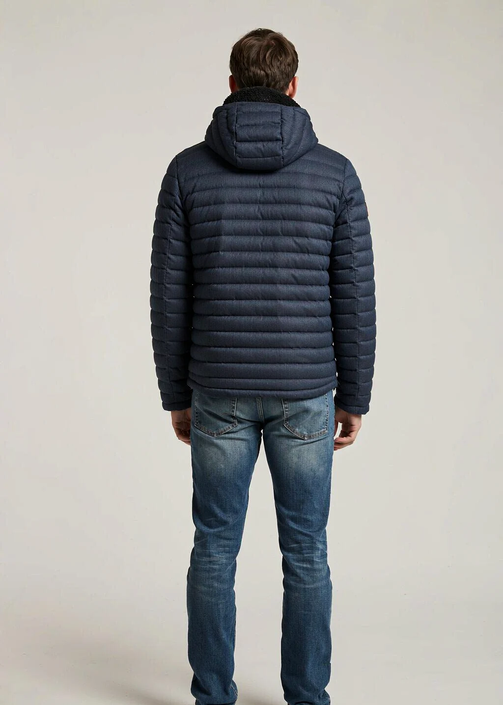 XH26AW0481 mens navy quilted hooded jacket model back view - AI generated
