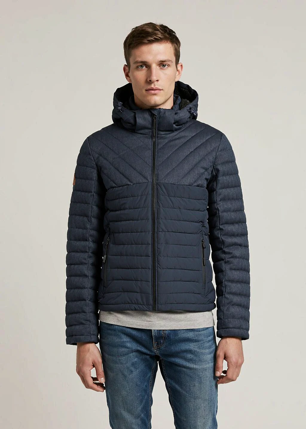 XH26AW0481 mens navy quilted hooded jacket model front view - AI generated