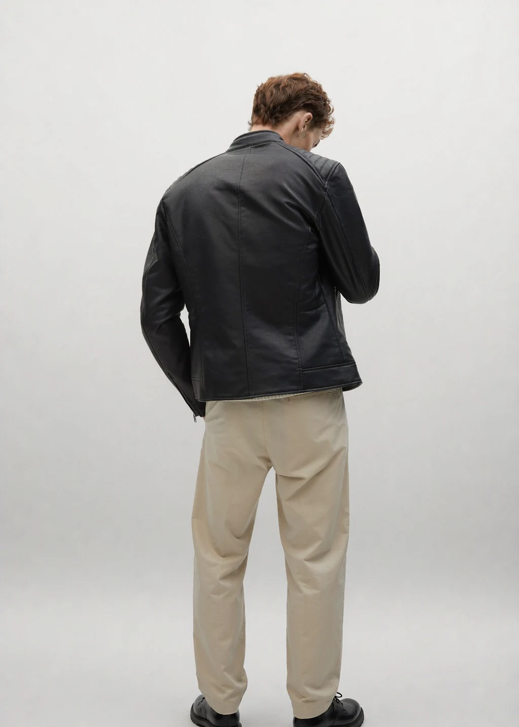 XH26AW1048 mens black faux leather biker jacket model back view - AI generated