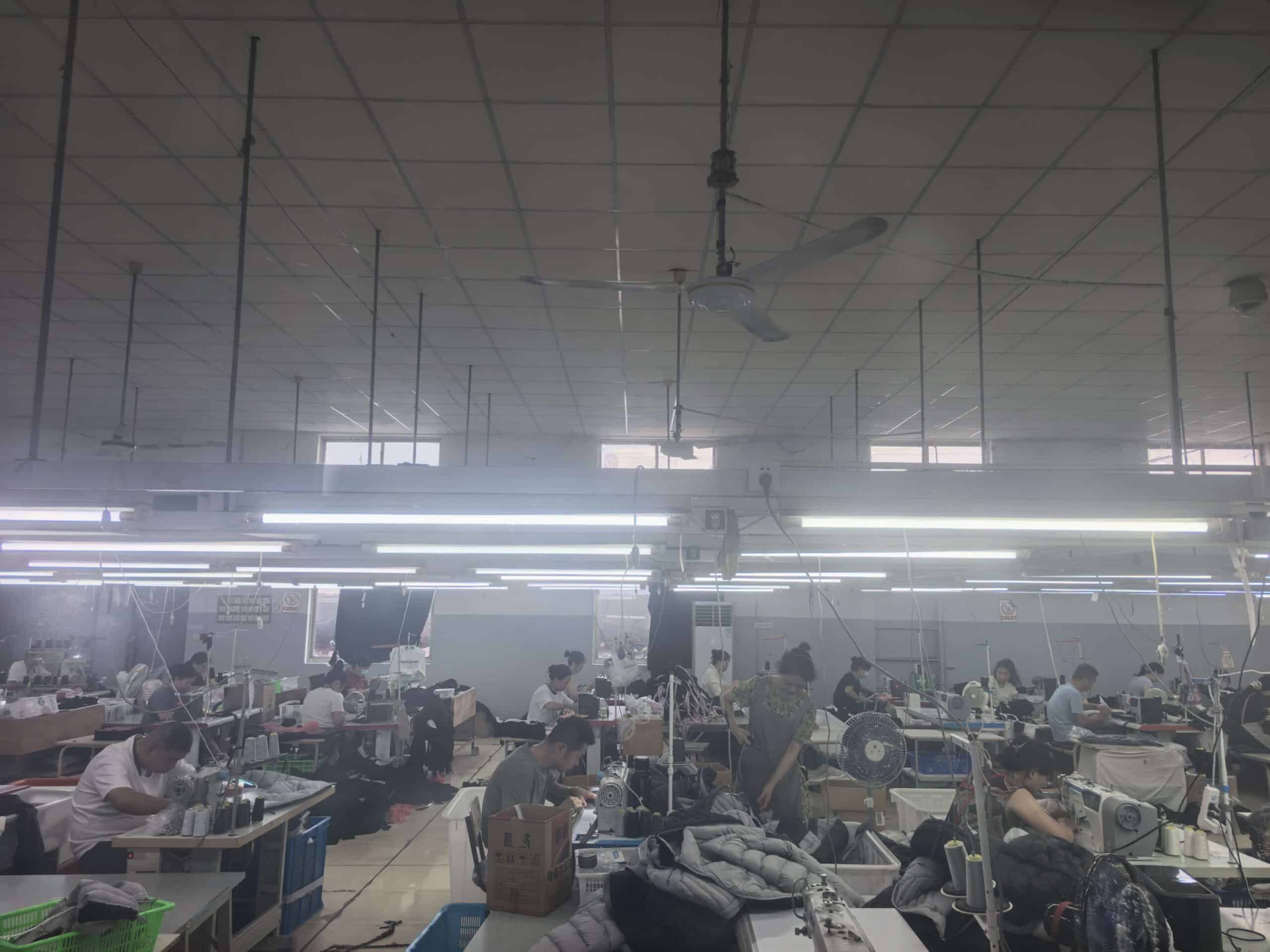 出货中 (4) Busy outerwear sewing line at Xinhua Apparel factory in China