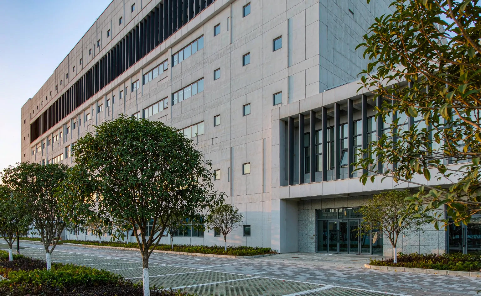 Modern garment factory building exterior in morning light